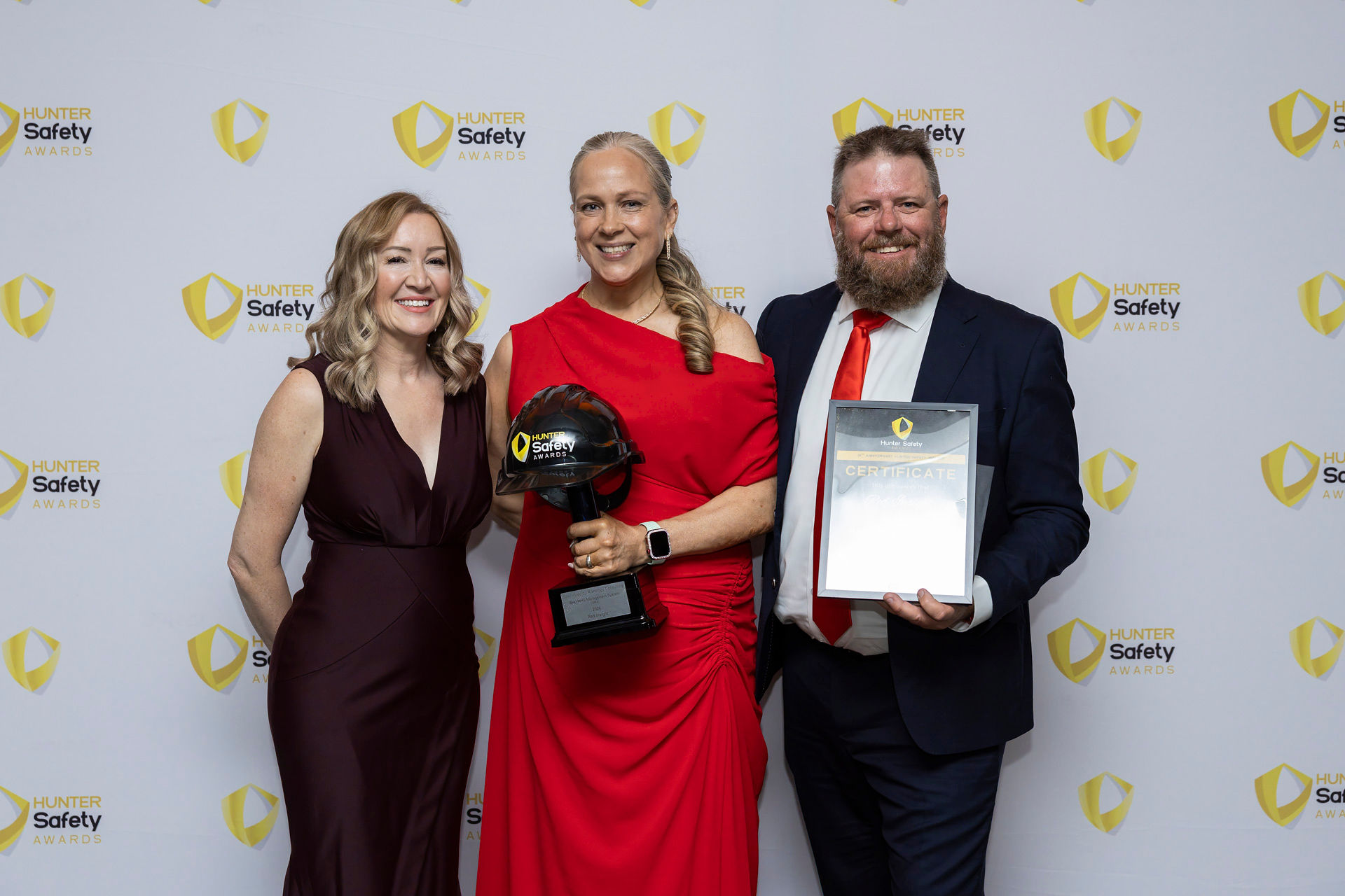 arah-Jane Dunford, Monica Toews Brown and James Brown at the 2026 Hunter Safety Awards following Red Insight's Best WHS Management System (SME) award win.